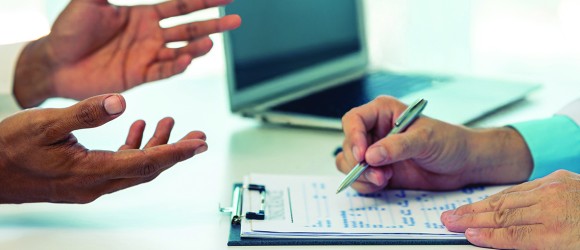 A young man is consulting a doctor about a health issue
