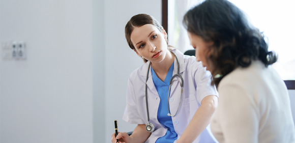 Patient meeting with doctor and discussing medical concerns